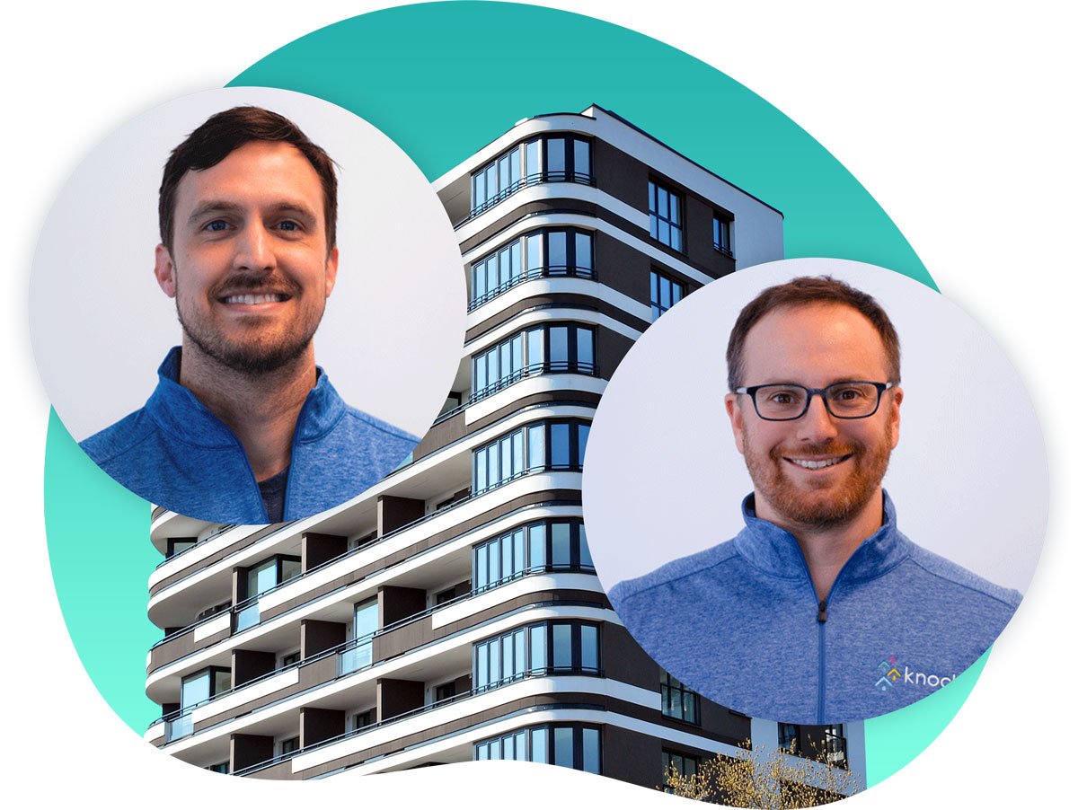 Tom Petry and Demetri Themelis in front of an apartment complex