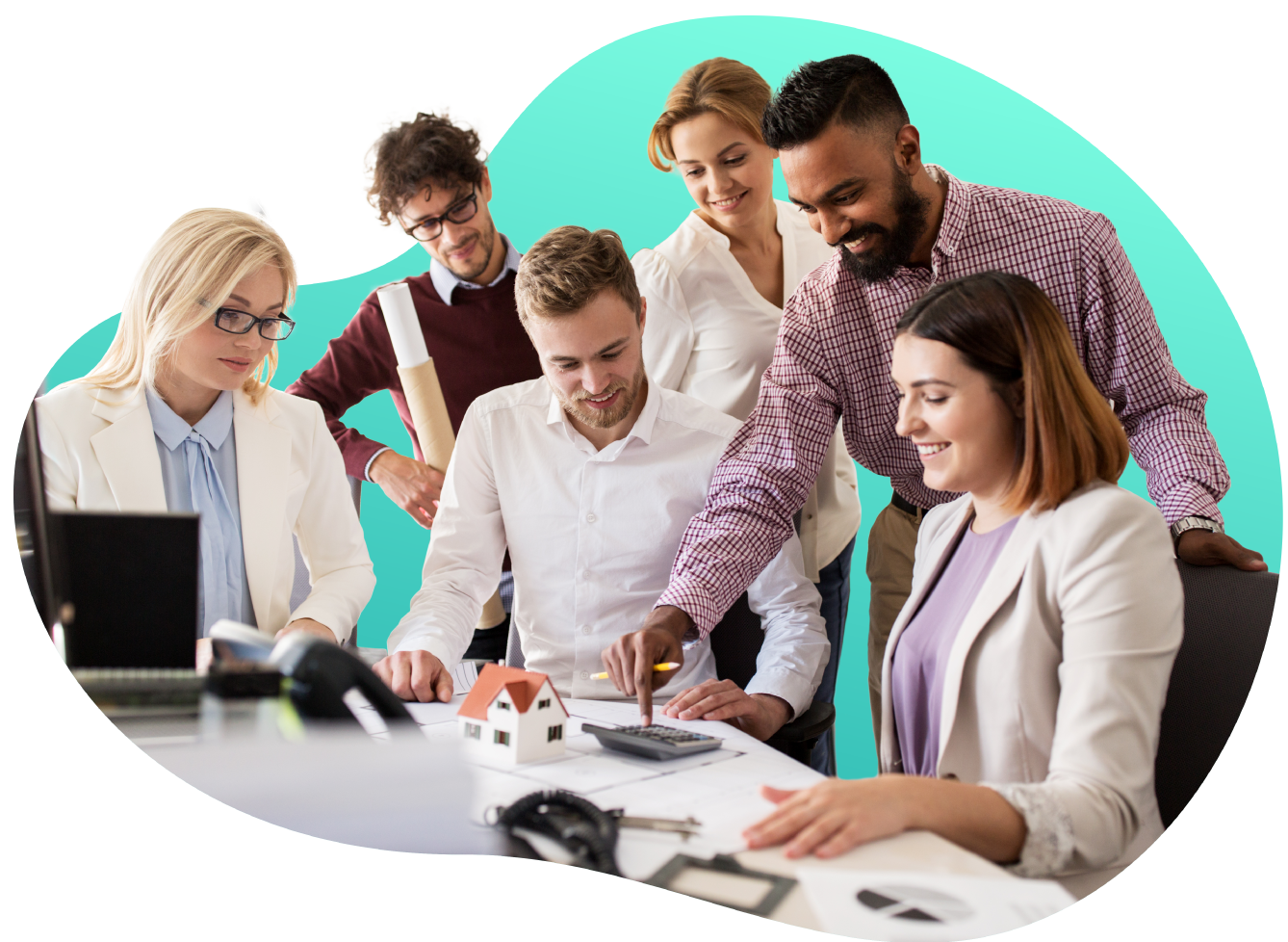 Group of co-workers looking at a calculator